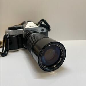 Canon AE-1 vintage 35mm film camera w/ 75-150mm FD lens